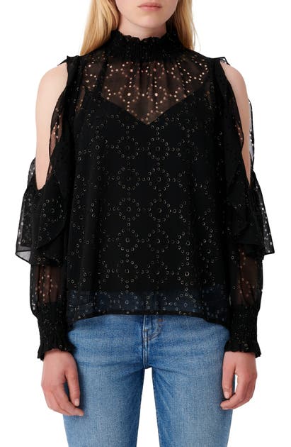 Click to view more detailed imagery on our partner's website Maje Cold Shoulder Mock Neck Blouse In Black