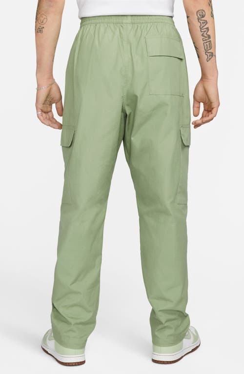 Shop Nike Club Woven Cargo Pants In Oil Green/white