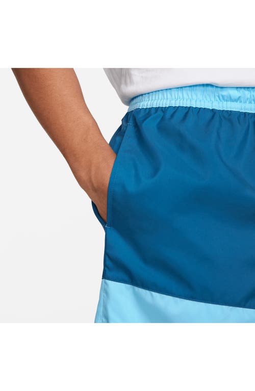 Shop Nike Essentials Colorblock Flow Shorts In Blue Chill/dark Blue/white