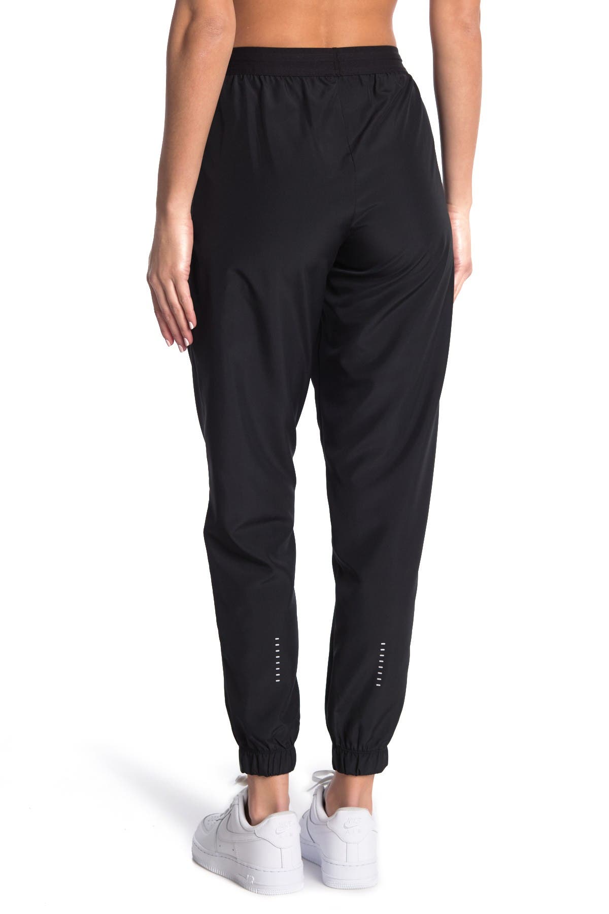 nike track pants swoosh