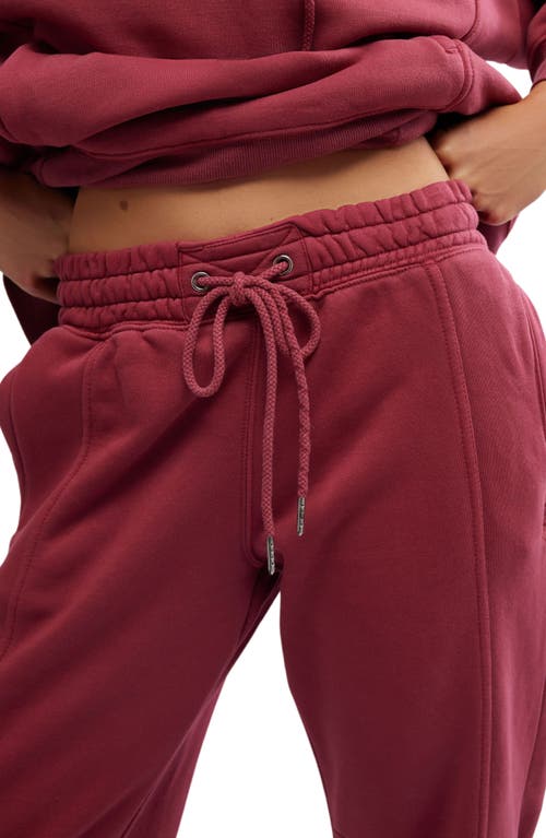 Shop Free People Sprint To The Finish Seamed Sweatpants In Sour Cherry