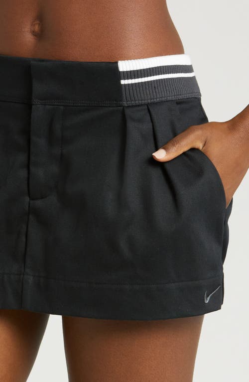 Shop Nike Sportswear Low Rise Canvas Miniskirt In Black/anthracite