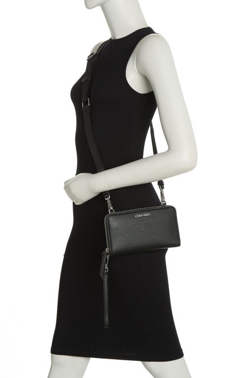 Shop Calvin Klein Marble Crossbody Bag In Black/silver