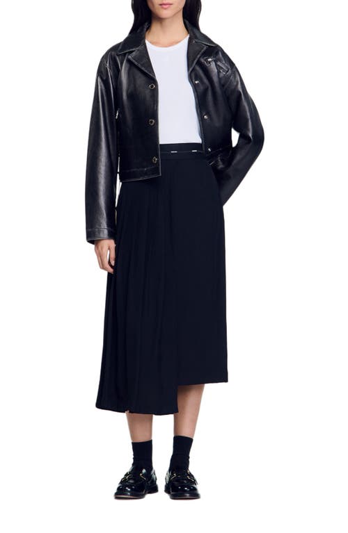 Shop Sandro Long Asymmetrical Skirt In Black