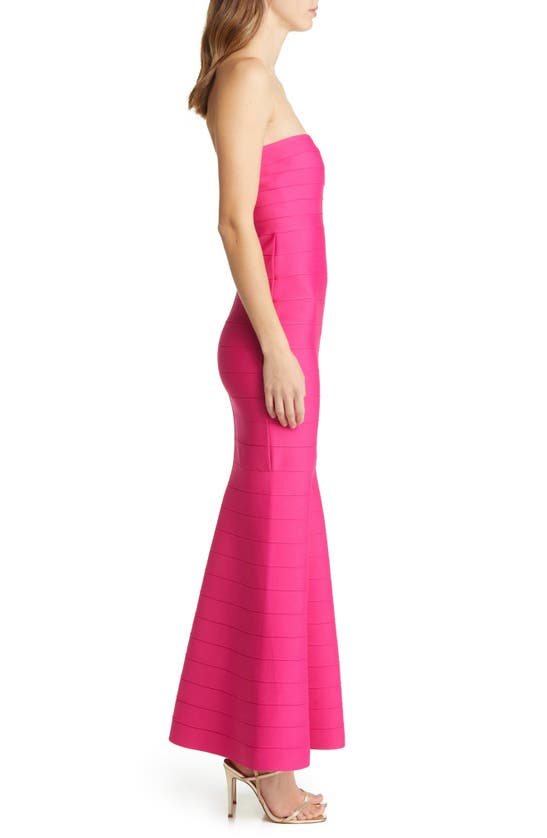 Shop Bebe Strapless Bandage Gown In Fuchsia