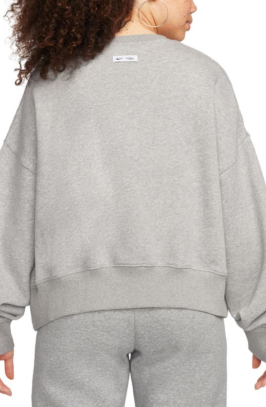 Shop Nike Phoenix Fleece Varsity Oversize Crewneck Sweatshirt In Dark Grey Heather