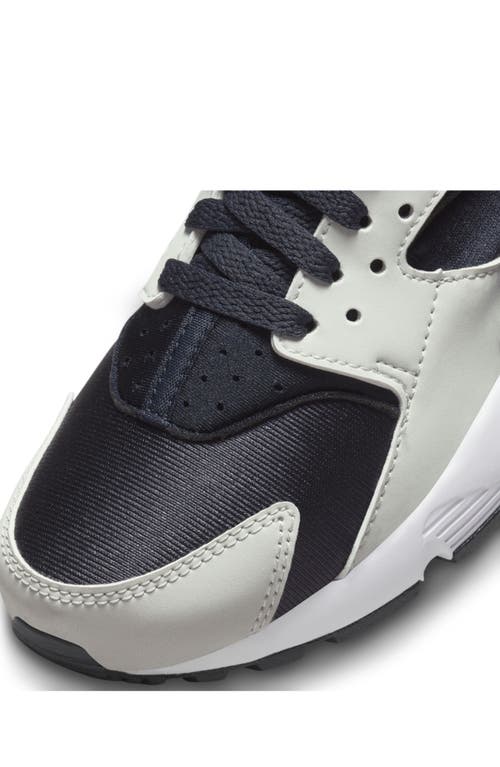 Shop Nike Huarache Run Sneaker In Dark Obsidian/red/dust