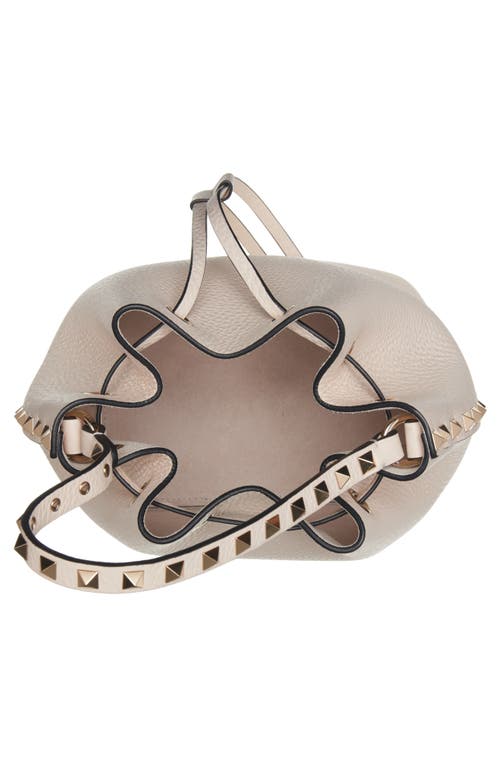 Shop Valentino Garavani Rockstud Leather Bucket Bag In Light Ivory