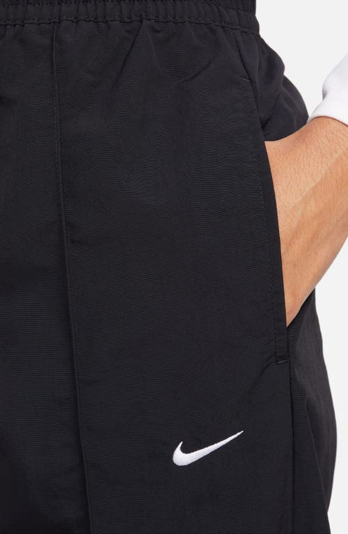 Shop Nike Wide Leg Pants In Black/white