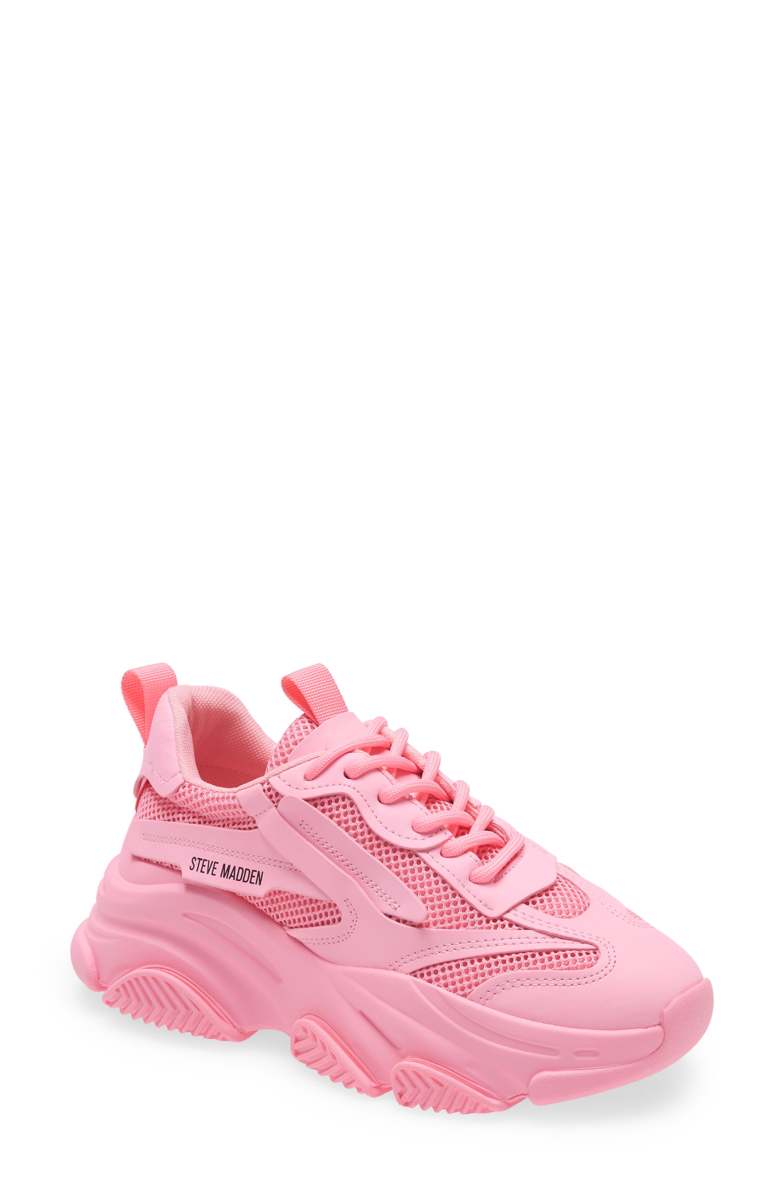 pink and white gym shoes