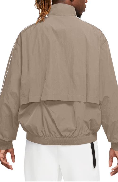 Shop Nike Solo Swoosh Track Jacket In Khaki/white