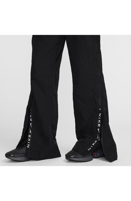 Shop Nike Sportswear Repel Zip Hem Pants In Black/white