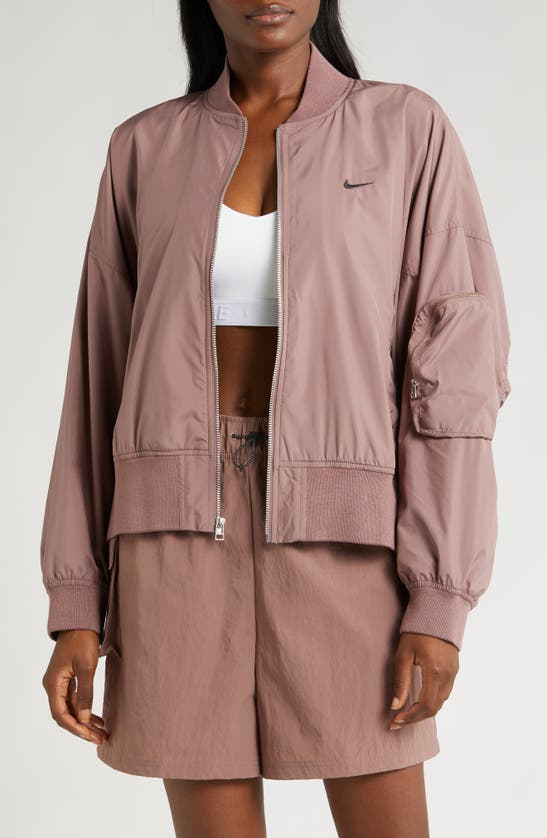 Shop Nike Sportswear Essentials Oversize Bomber Jacket In Smokey Mauve/ Black