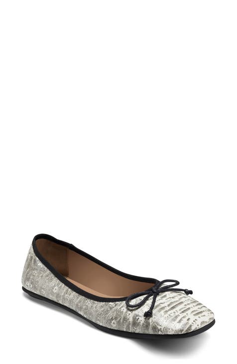 white fabric flats