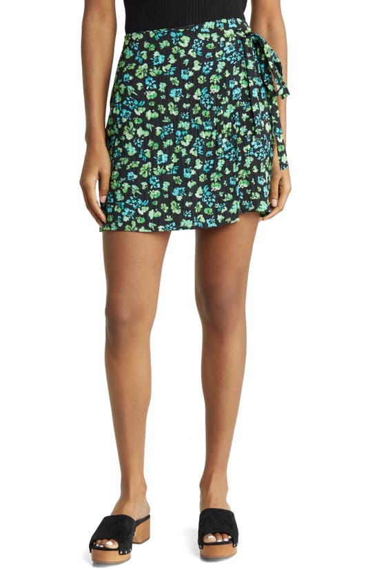 Shop Noisy May Cate High Waist Faux Wrap Miniskirt In Black Aop Green Flower