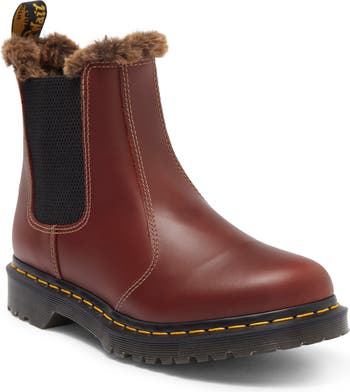 Doctor Martens shoes, straight jeans and fuzzy faux fur high neck