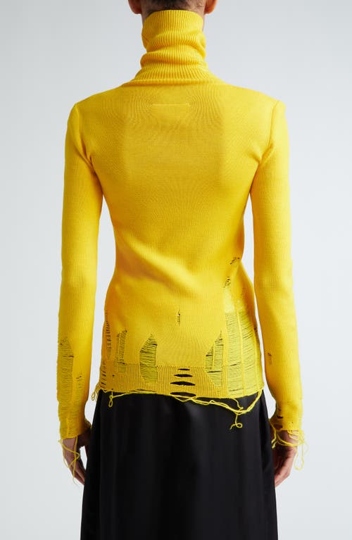 Shop Mm6 Maison Margiela Ripped Virgin Wool Blend Turtleneck Sweater In Yellow