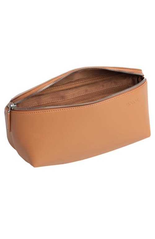 Shop Monos Metro Sling Bag In Saddle Tan