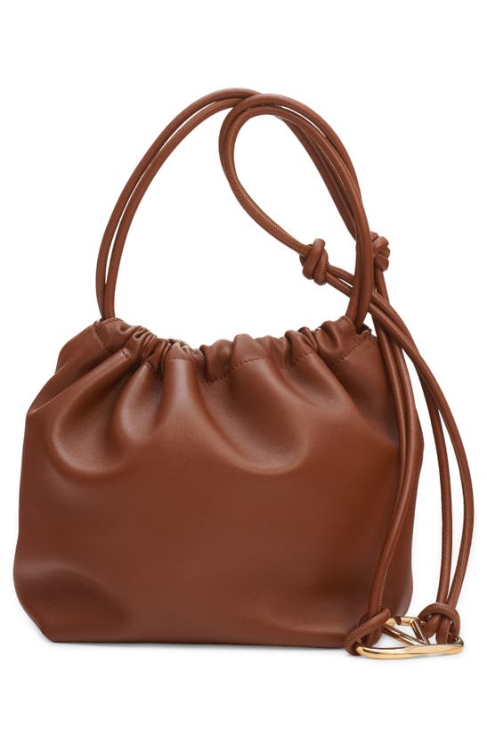 Shop Valentino Garavani Medium Vlogo Leather Drawstring Bag In N58 Tobacco