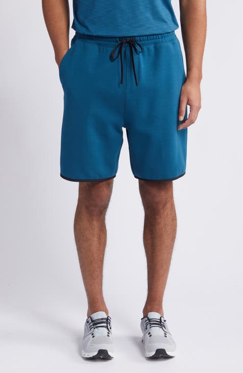 Green shirt best sale blue shorts