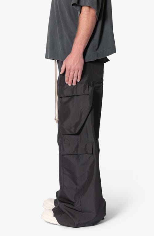 Shop Mnml Rave Oversize Double Cargo Pocket Pants In Black