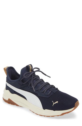 Puma Stride Exero Sneaker In  Navy-warm White-almond