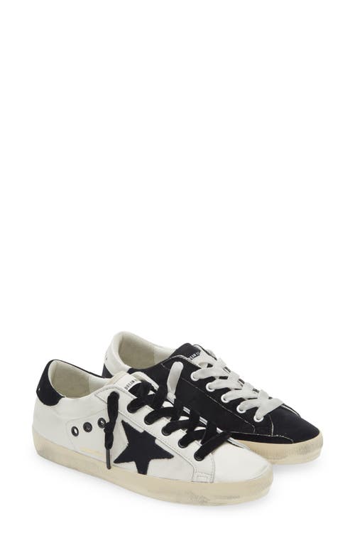 Shop Golden Goose Super-star Low Top Sneaker In White/black