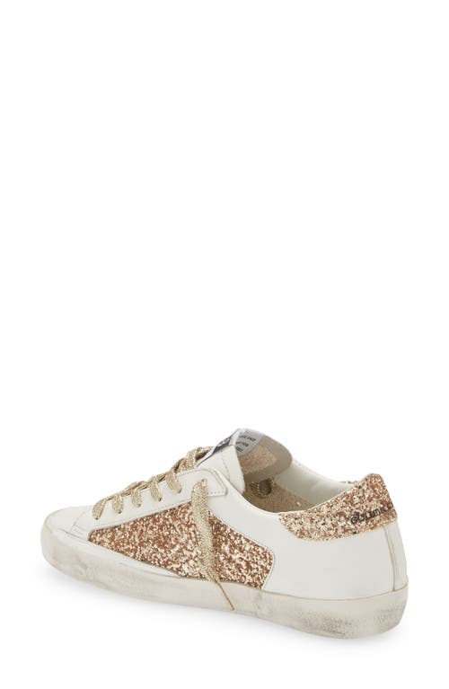 Shop Golden Goose Super-star Low Top Sneaker In Gold/white