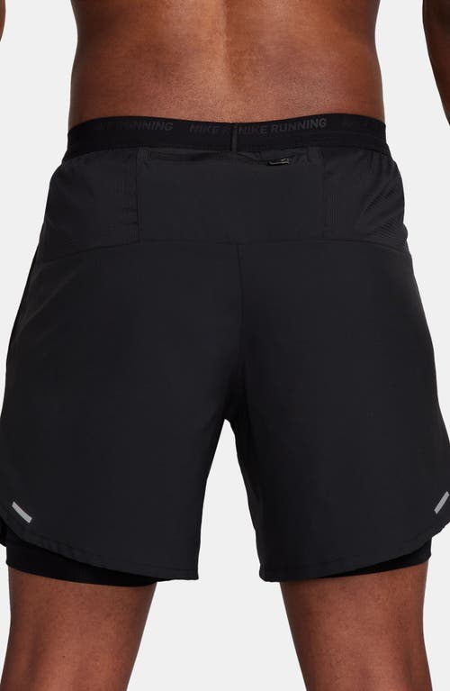Shop Nike Dri-fit Stride 2-in-1 Running Shorts In Black/black/silver
