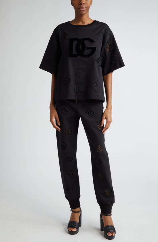 Dolce & Gabbana Eyelet Logo Cotton Blend Joggers In N0000nero