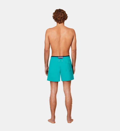 Shop Vilebrequin Solid Bicolor Length Swim Trunks In Vert Tropezien