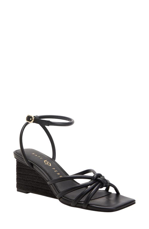The Irisia Ankle Strap Wedge Sandal in Black