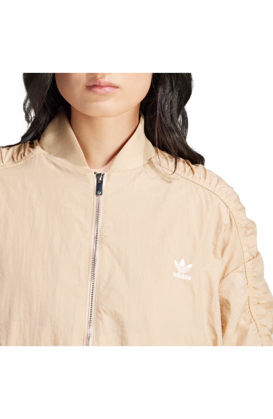 Shop Adidas Originals Oversize Ruched Sleeve Bomber Jacket In Magic Beige