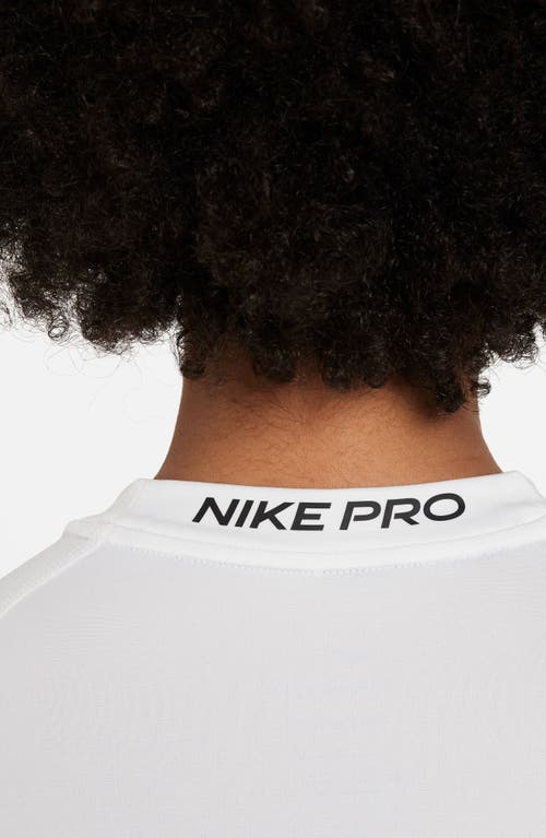 Shop Nike Kids' Pro Dri-fit Long Sleeve Top In White/black