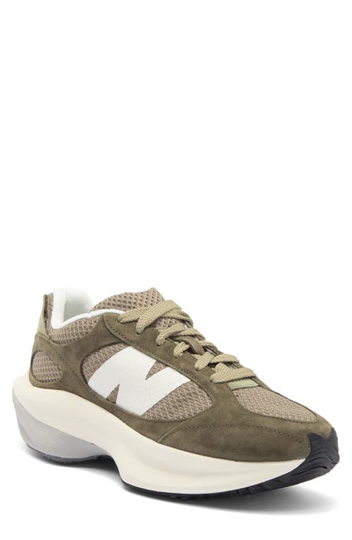 Shop New Balance Gender Inclusive Wrpd Runner Sneaker In Dark Moss/dark Stoneware