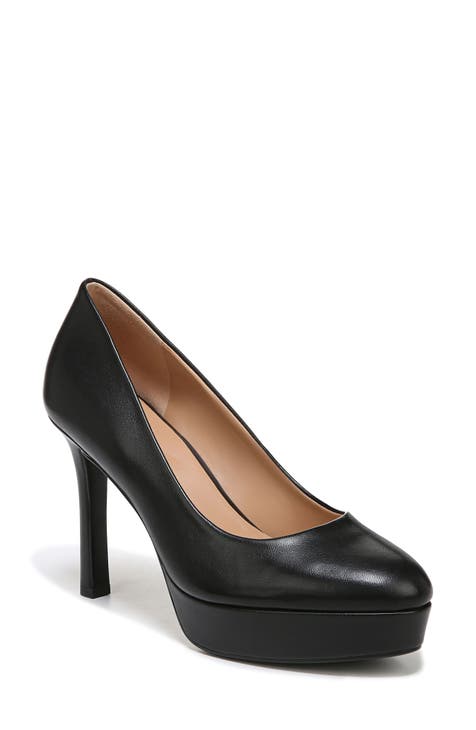 a pair of beautiful women's shoes patent leather with heels Stock