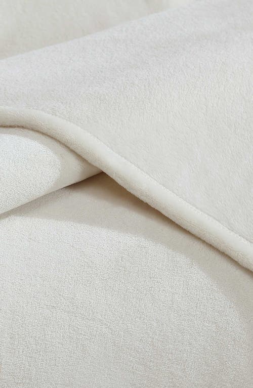 Shop Calvin Klein Core Plush Blanket In Beige/tan