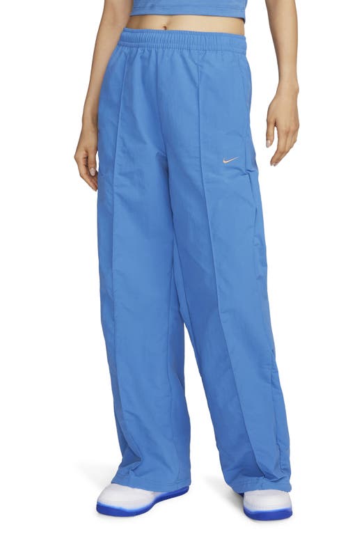 Shop Nike Wide Leg Pants In Star Blue/metallic Copper