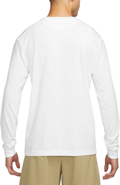 Shop Nike Dri-fit Primary Long Sleeve T-shirt In White/white