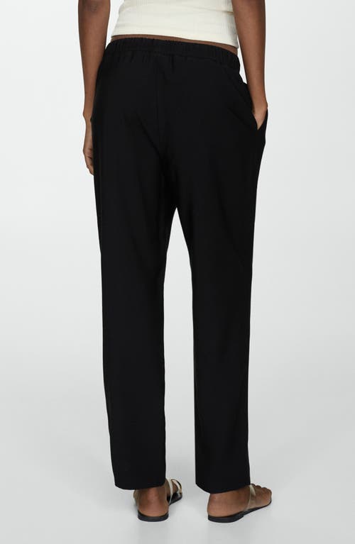 Shop Mango Elastic Waist Jogger Trousers In Black