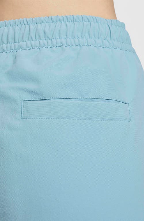 Shop Nike Wide Leg Pants In Denim Turquoise/sail