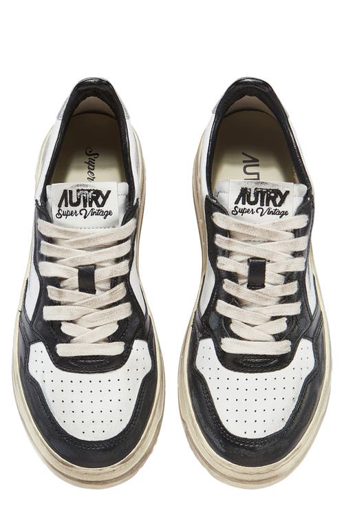 Shop Autry Medalist Super Low Sneaker In White/black/silver