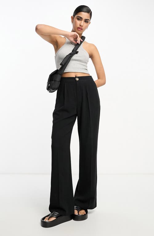ASOS DESIGN Relaxed Fit Flare Trousers in Black