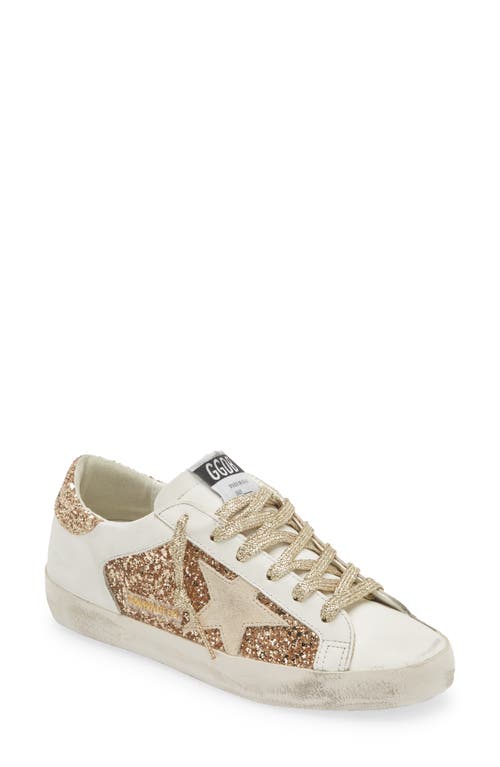 Shop Golden Goose Super-star Low Top Sneaker In Gold/white