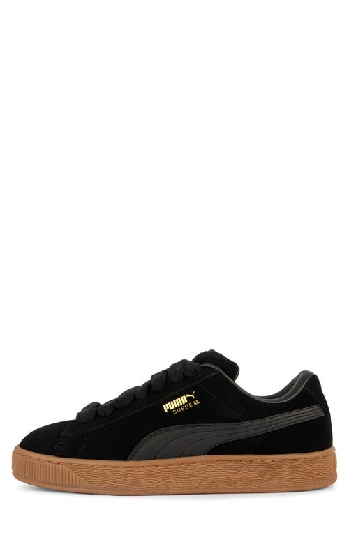 Shop Puma Suede Xl Sneaker In  Black- Team Gold