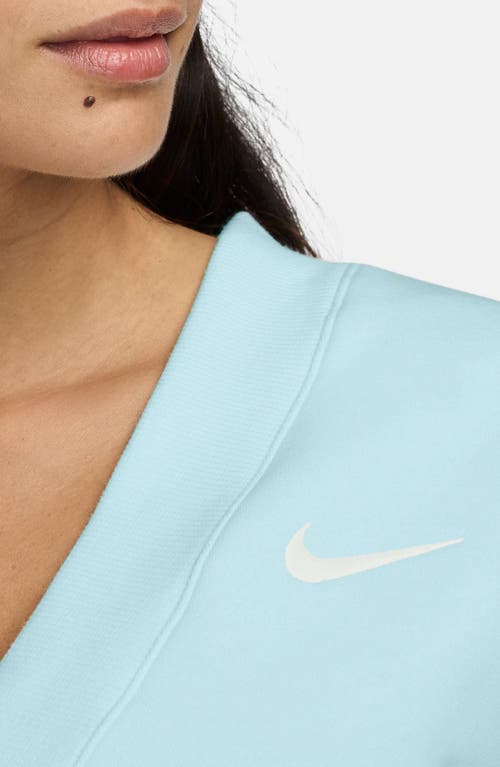 Shop Nike Sportswear Phoenix Fleece Cap Sleeve V-neck Crop Sweatshirt In Glacier Blue/sail