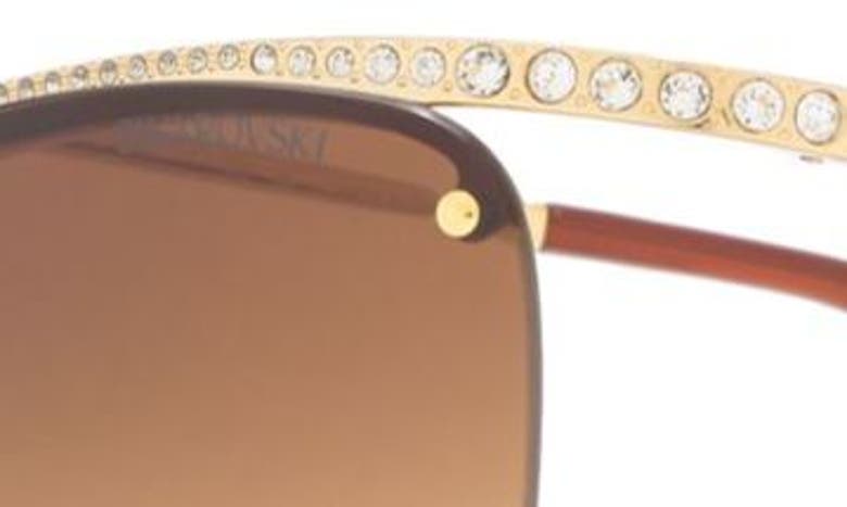 Shop Swarovski 63mm Gradient Irregular Sunglasses In Gold