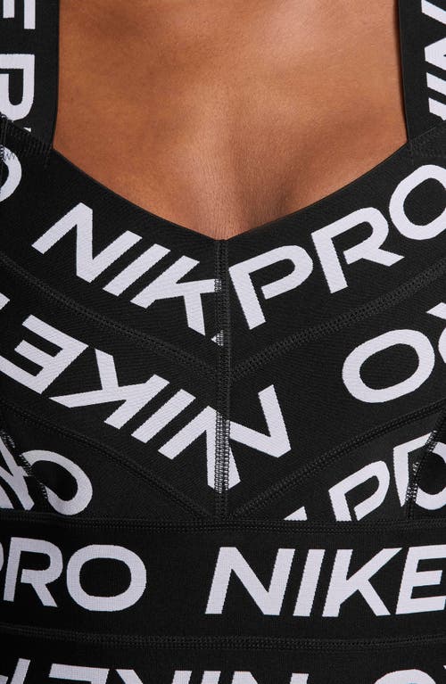 Shop Nike Pro Bandage Dress In Black/white