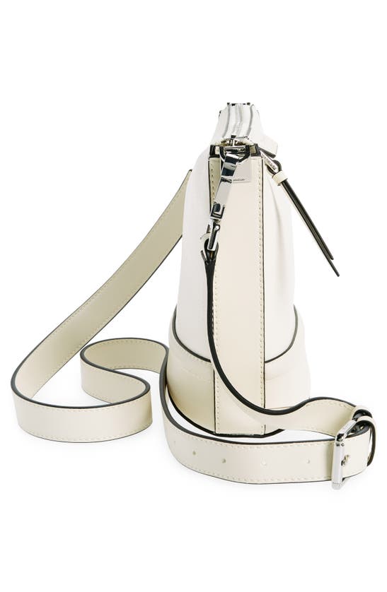 Shop Calvin Klein Ash Top Zip Crossbody Bag In Cherub White