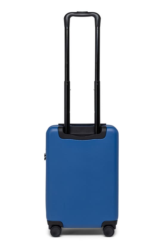 Shop Herschel Supply Co . Heritage™ Hardshell Carry-on Luggage In True Blue